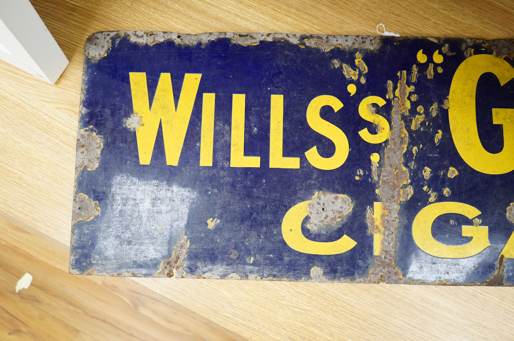 A Wills’s Gold Cigarette rectangular enamel advertising sign, 38 x 117cm